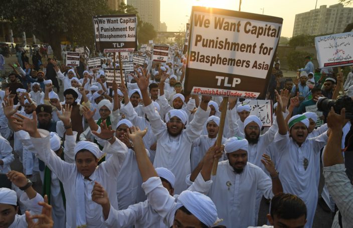 Islamist activists carry placards against Asia Bibi, a Pakistani Christian woman who was recently acquitted of blasphemy, during a rally in Karachi on Nov. 21, 2018. Asif Hassan—AFP/Getty Images